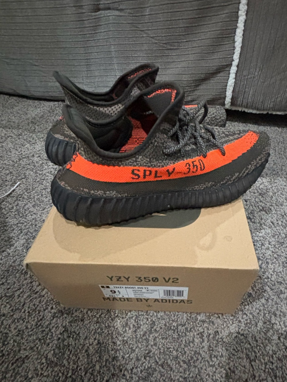 Yeezy Boost 350 Sneakers - Black with Bright Orange Stripe
